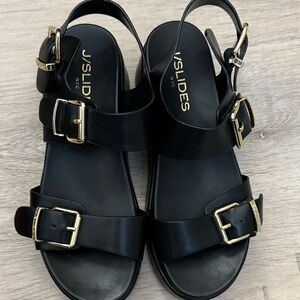 J/SLIDES Black Sandals with Gold Accents